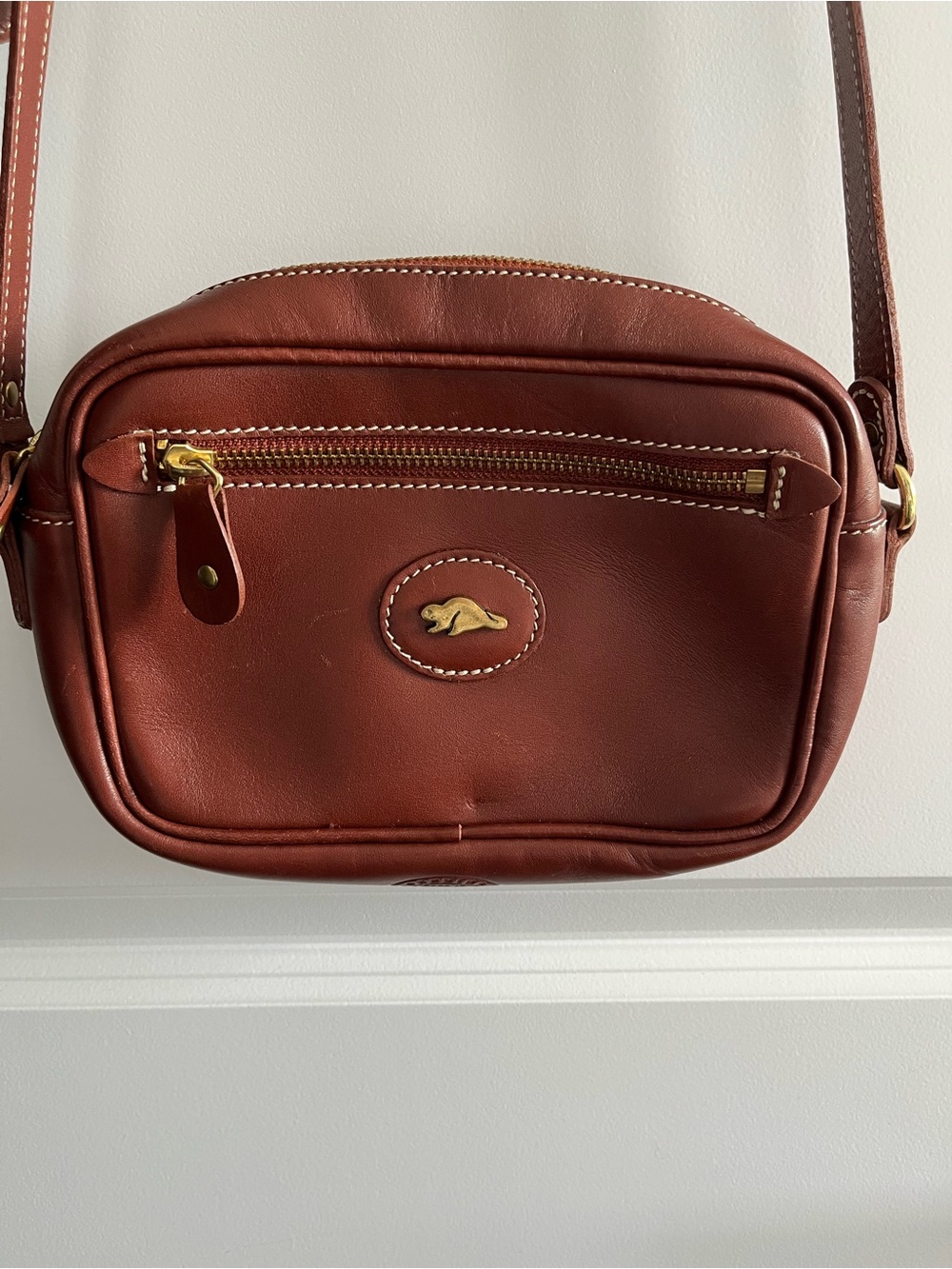 Roots Brown Leather Crossbody Bag with Gold Accent